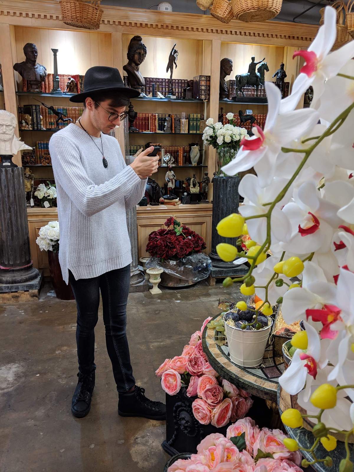 Jeff photographing flowers in a floral supply warehouse